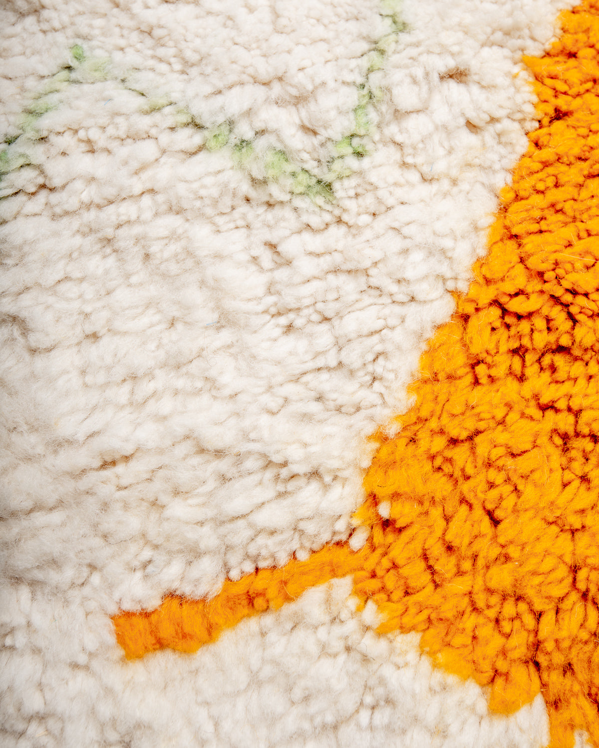 Modern, designer, handcrafted Berber rug from Morocco. Beniourain carpet with beautiful colours and patterns and fluffy wool texture.